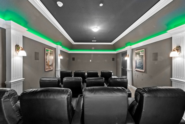 home theater featuring a textured ceiling and crown molding