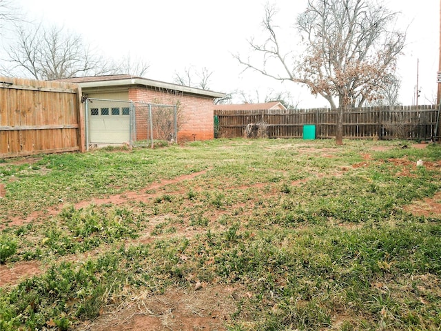 view of yard featuring a fenced backyard