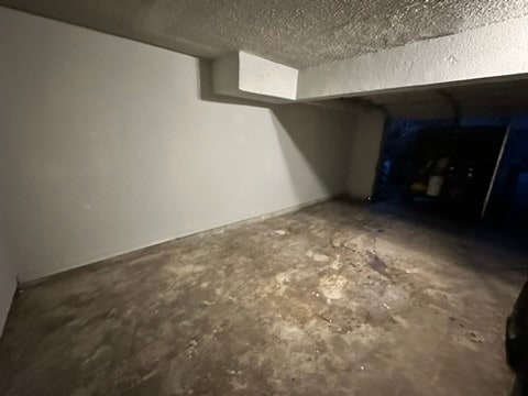 interior space featuring a textured ceiling