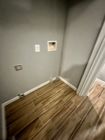 laundry room with hookup for a washing machine and hardwood / wood-style floors