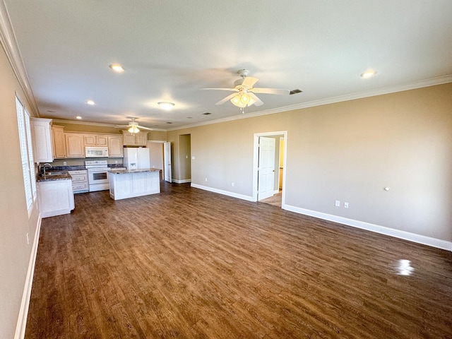 unfurnished living room featuring ornamental molding, sink, ceiling fan, and dark hardwood / wood-style floors