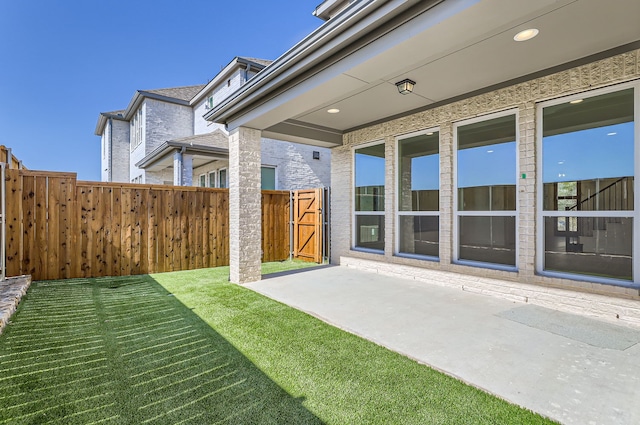 view of yard with a patio area