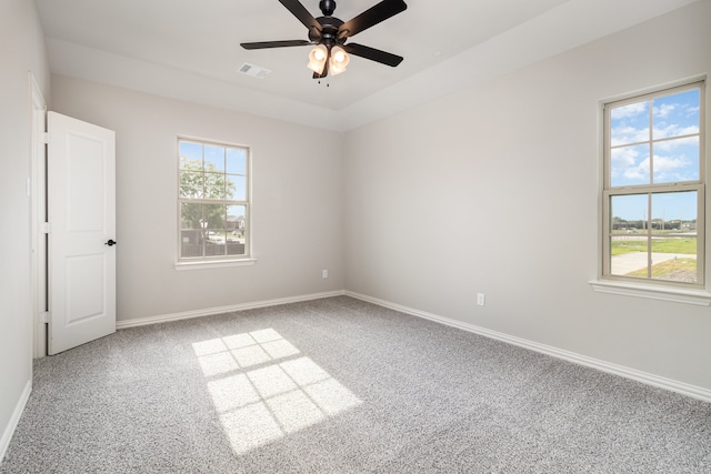 empty room with carpet and ceiling fan