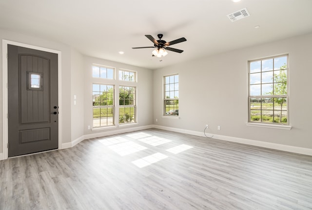 interior space featuring light hardwood / wood-style flooring and ceiling fan