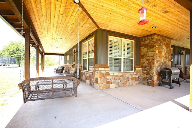 view of patio with a grill