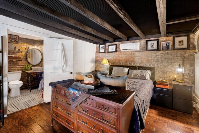 bedroom featuring brick wall, dark wood-type flooring, beamed ceiling, and a wall unit AC