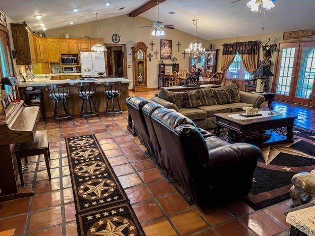 tiled living room with ceiling fan with notable chandelier, lofted ceiling with beams, french doors, and sink