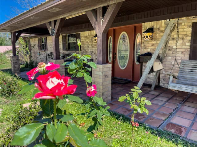 entrance to property with a porch