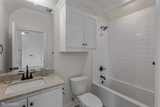 full bathroom featuring ornamental molding, tiled shower / bath, toilet, and vanity