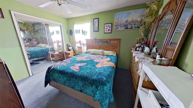 carpeted bedroom with a closet and ceiling fan