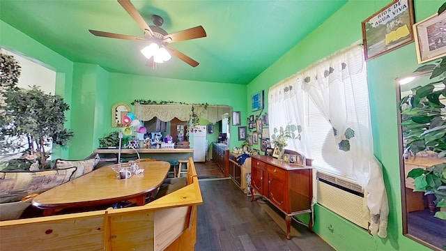 interior space with ceiling fan and dark wood-type flooring