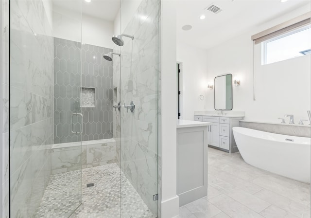 bathroom with vanity and plus walk in shower