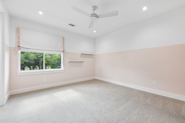 spare room with ceiling fan and carpet flooring