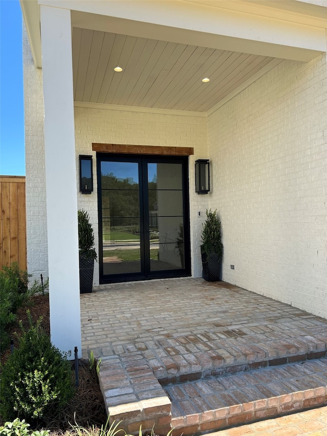 doorway to property featuring a patio and french doors