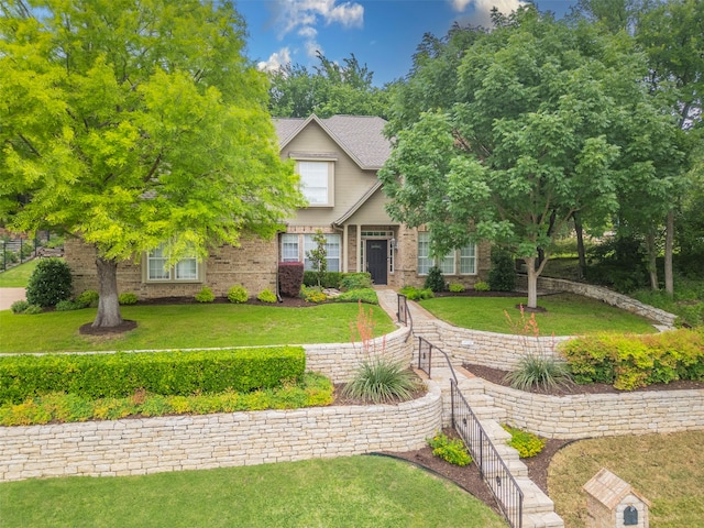 view of front of property with a front lawn