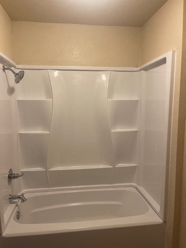 bathroom with shower / bathing tub combination