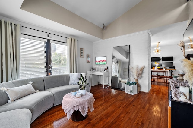 living room featuring dark hardwood / wood-style floors, high vaulted ceiling, and an inviting chandelier