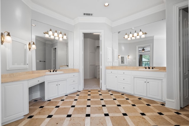 bathroom with ornamental molding, tile floors, and vanity