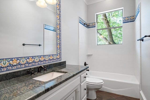 full bathroom with tiled shower / bath combo, vanity, ornamental molding, tile flooring, and toilet