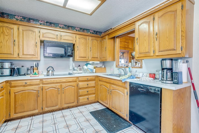 kitchen with a textured ceiling, sink, light tile floors, and black appliances