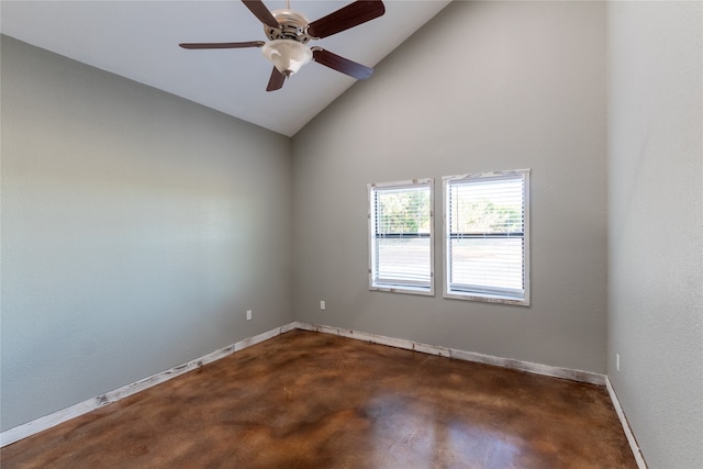 empty room featuring ceiling fan and high vaulted ceiling