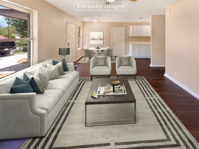 living room with dark wood-type flooring