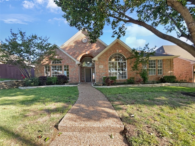 ranch-style house with a front lawn