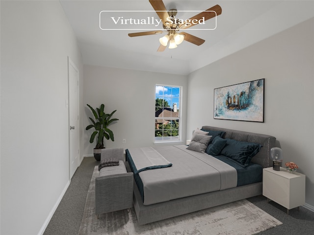 carpeted bedroom featuring ceiling fan