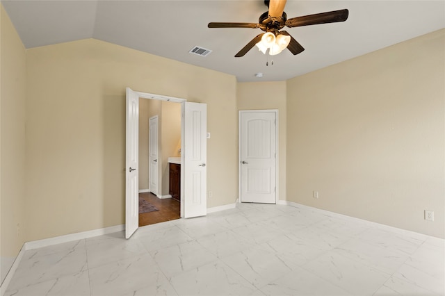 unfurnished bedroom featuring lofted ceiling, ceiling fan, and light tile floors