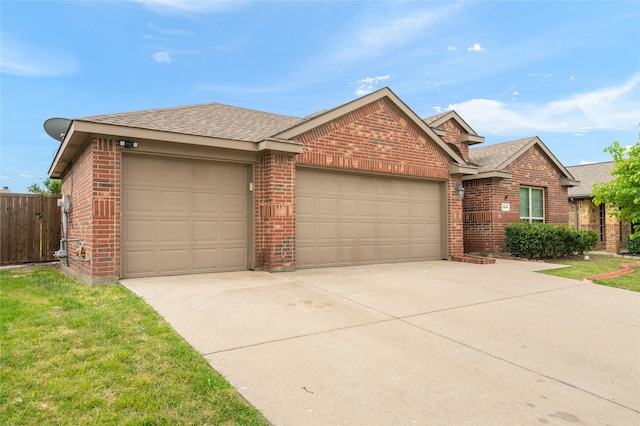 ranch-style house featuring a garage