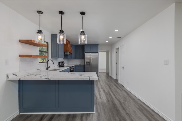 kitchen featuring kitchen peninsula, custom range hood, dark hardwood / wood-style flooring, and appliances with stainless steel finishes