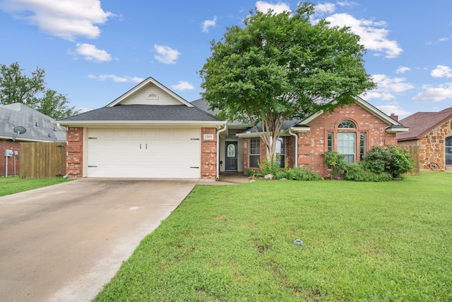 ranch-style home featuring a front lawn and a garage