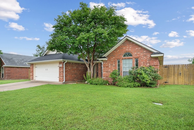 single story home with a front yard and a garage