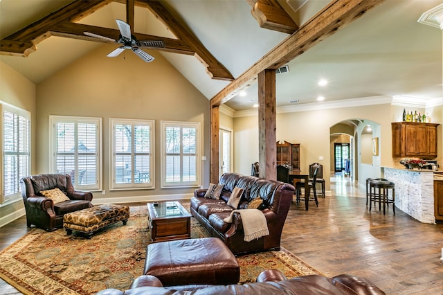 living room with high vaulted ceiling, ceiling fan, hardwood / wood-style flooring, and beam ceiling