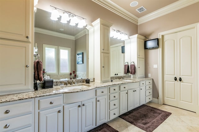 bathroom featuring tile floors, double vanity, and ornamental molding