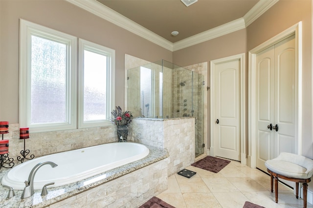 bathroom with tile flooring, ornamental molding, and separate shower and tub