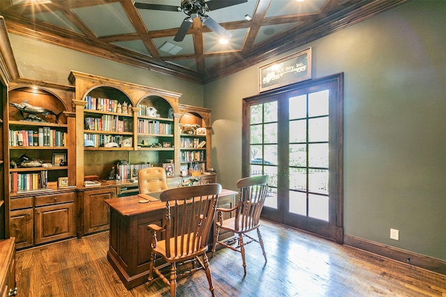 office featuring ornamental molding, wood-type flooring, ceiling fan, and coffered ceiling