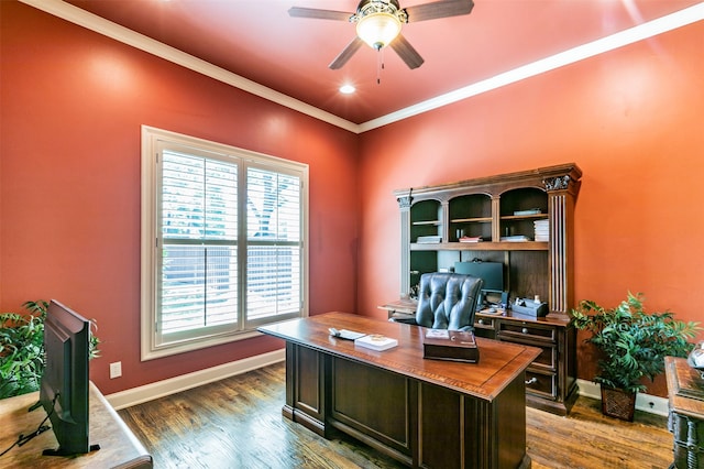 office space featuring ornamental molding, ceiling fan, and dark hardwood / wood-style floors