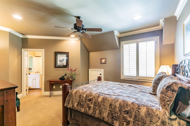 bedroom featuring crown molding, light colored carpet, connected bathroom, and ceiling fan