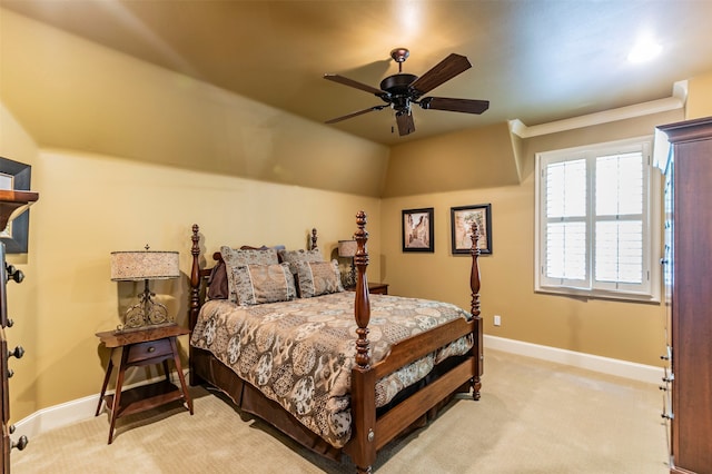 bedroom featuring ceiling fan and light carpet