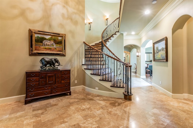 stairway featuring tile floors and crown molding