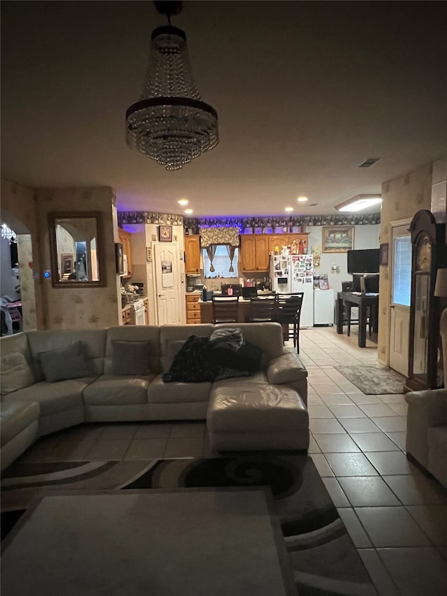 living room featuring light tile floors