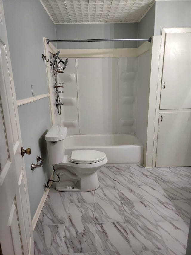 bathroom featuring shower / bath combination, toilet, and tile floors