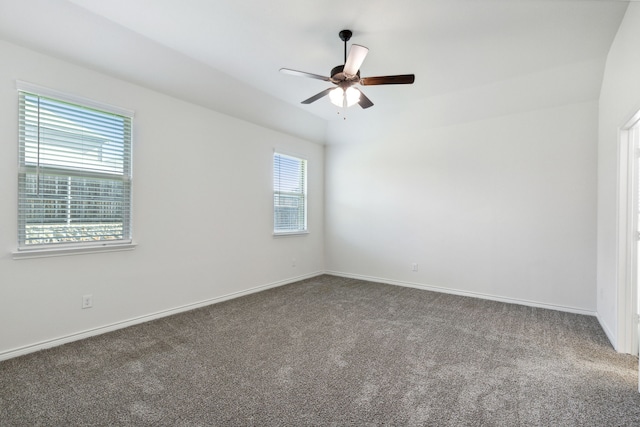 spare room with carpet and ceiling fan