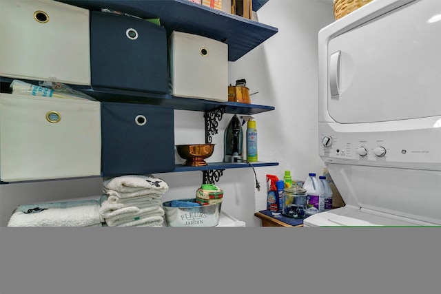 laundry room featuring stacked washer / dryer