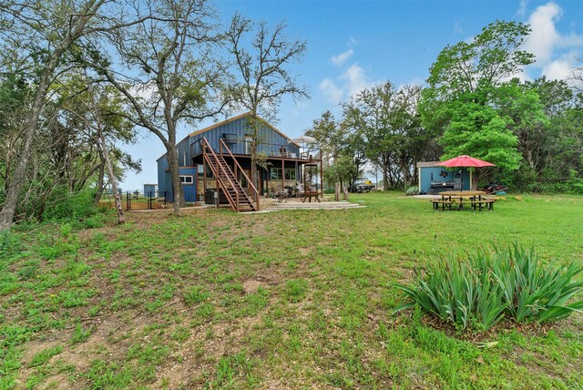 view of yard featuring a deck