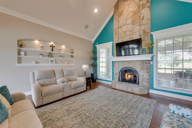 living room with high vaulted ceiling, a fireplace, built in shelves, and dark hardwood / wood-style flooring