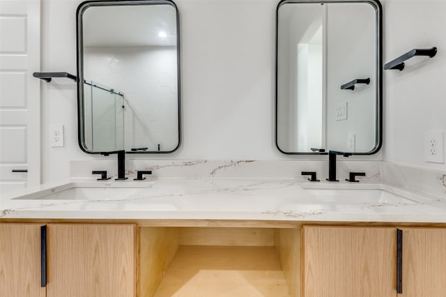 bathroom featuring double sink vanity