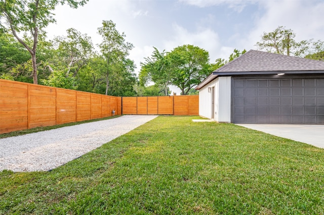 view of yard featuring a garage