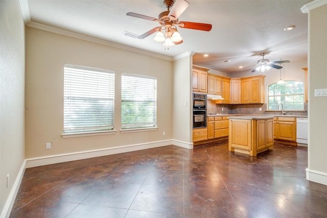 kitchen featuring dishwasher, a center island, light brown cabinets, crown molding, and tasteful backsplash